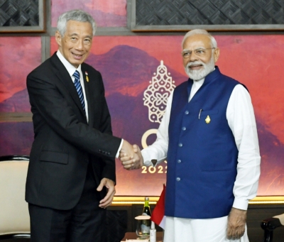Modi meets S'pore, Italian PMs in Bali; invites them to India