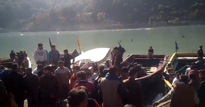Braving extreme chill, thousands take dip in Himachal rivers