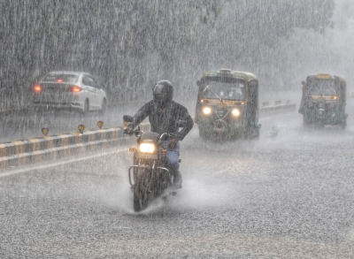 Portion of road caves in as heavy rain lashes Delhi