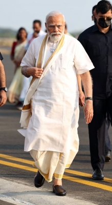 PM Modi arrives at Kochi in traditional Kerala attire