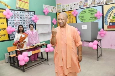 UP civic elections: Voting begins in 37 districts in first phase, Yogi casts vote